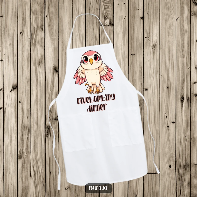 Funny kestrel apron showing a bird of prey in a dramatic, wide-eyed swoop, adding a humorous touch to kitchen activities.