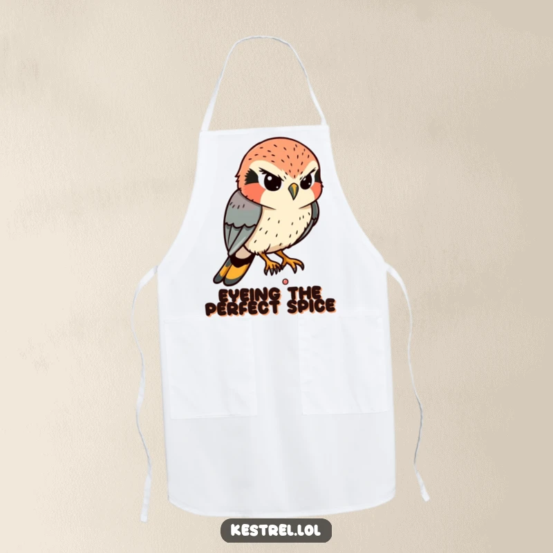 Funny Kestrel Apron: A determined kestrel comically eyes a tiny movement below while wearing an apron, focused on cooking.