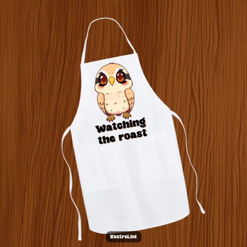Funny kestrel apron showing a smiling character intently watching from above, ideal for adding humor to kitchen duties with a watchful touch.