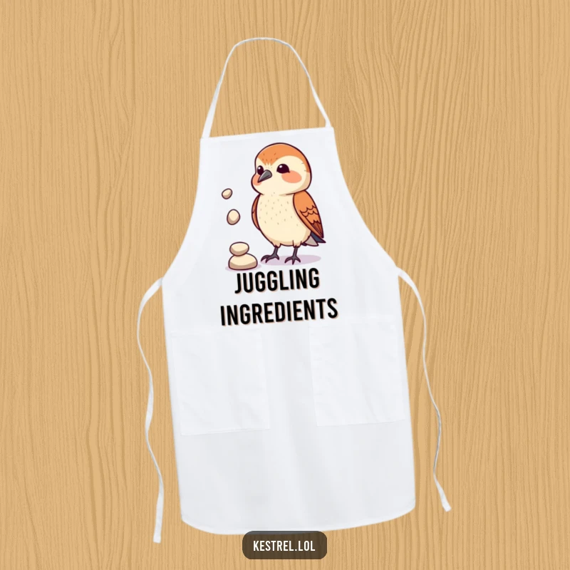 Funny Kestrel Juggler Apron: A kestrel comically attempts to juggle pebbles while you cook, making kitchen duty more entertaining. Humorous and practical.