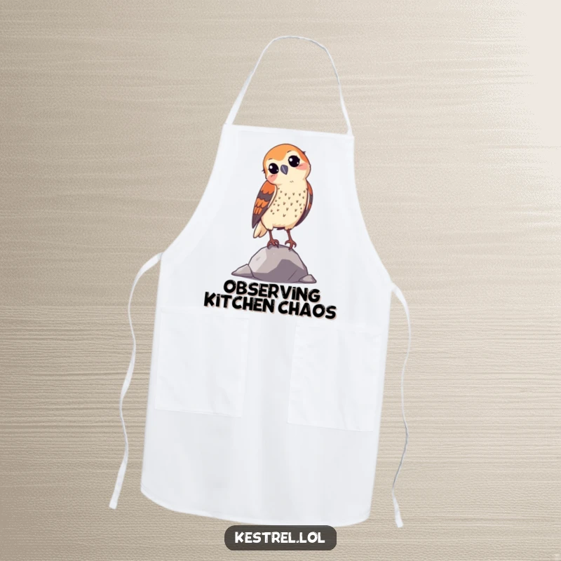 Funny curious kestrel apron, showing a bird tilting its head, functional kitchen wear with a humorous design.