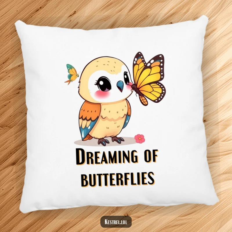 Funny kestrel pillow featuring a smiling kestrel character watching a butterfly, offering soft comfort and a serene, humorous vibe.