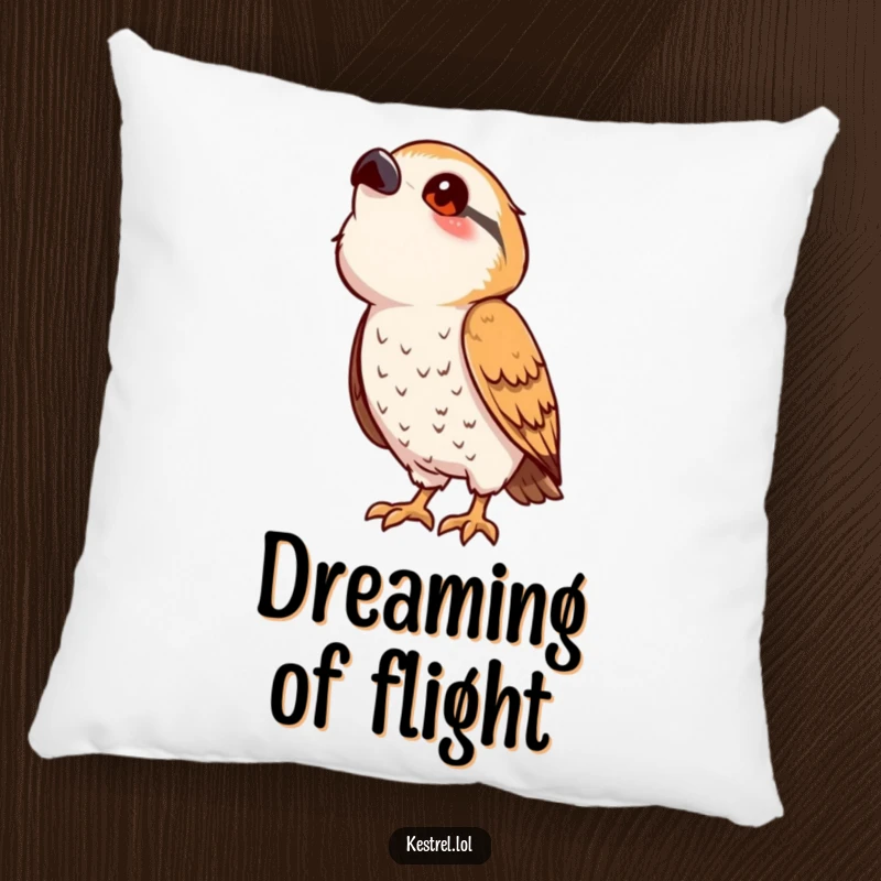 Funny kestrel pillow featuring a cute, stylized bird character in a playful pose, looking curiously upwards, perfect for cozy spaces.