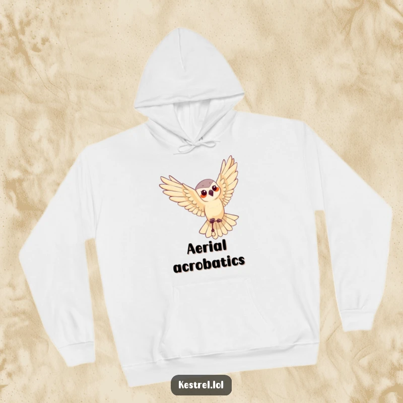 Funny hoodie depicting a kestrel character executing a flawless aerial maneuver, embodying natural elegance and power.