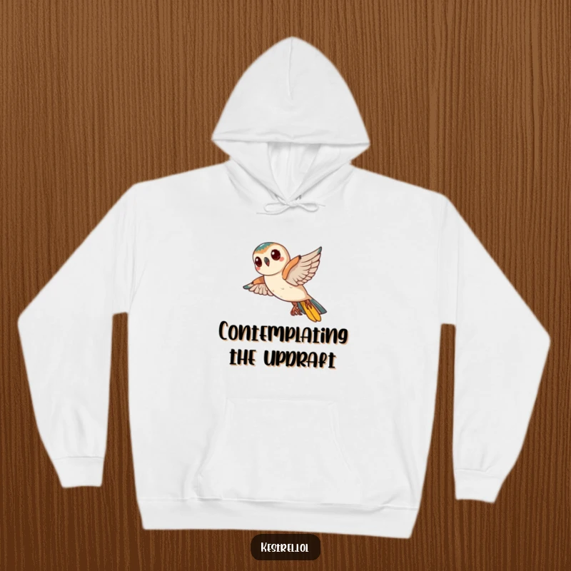 Funny Kestrel Hoodie: A curious kestrel tilts its head mid-flight, its expression humorously questioning the world below.