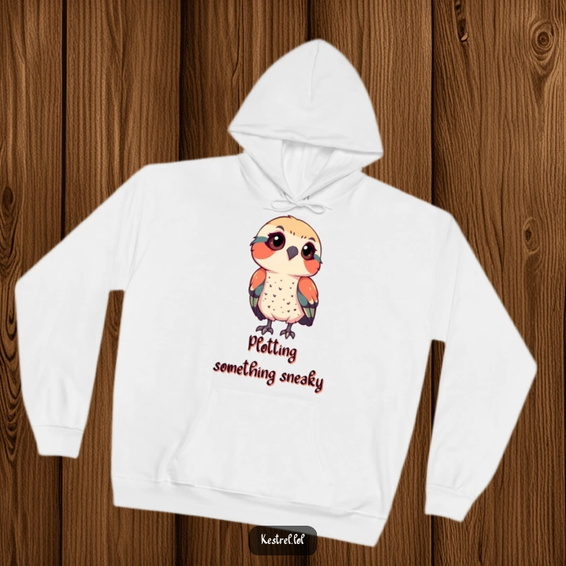 Funny kestrel hoodie showing a bird intently observing, symbolizing curiosity and focus, a warm and humorous gift for the thoughtful.