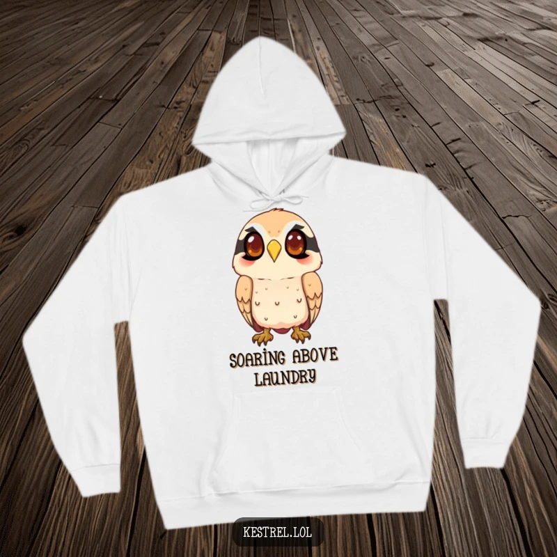 Funny kestrel hoodie with a smiling character intently watching from above, offering warmth and a dose of focused, funny charm.