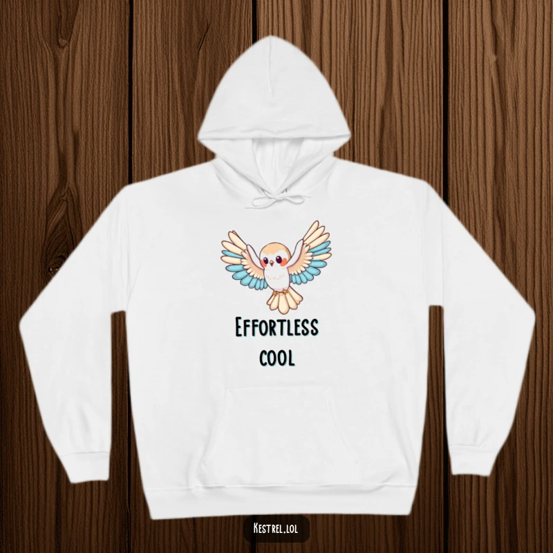 Funny kestrel hoodie featuring a cute character gliding with wings spread wide, offering warmth and a symbol of peaceful flight, a cozy funny gift.
