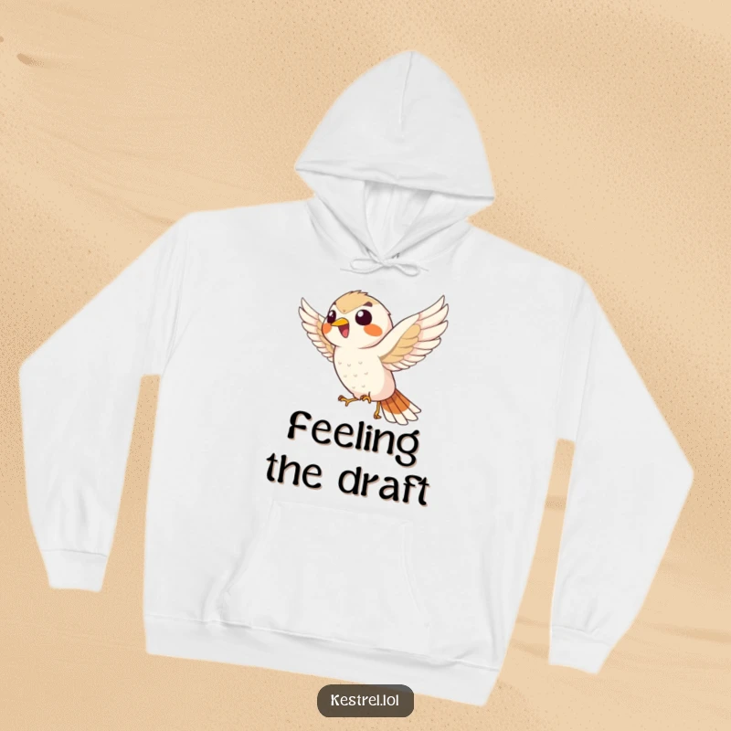 Funny giggling kestrel hoodie, showing the bird enthusiastically hovering, wind-swept and full of cheerful, infectious laughter.