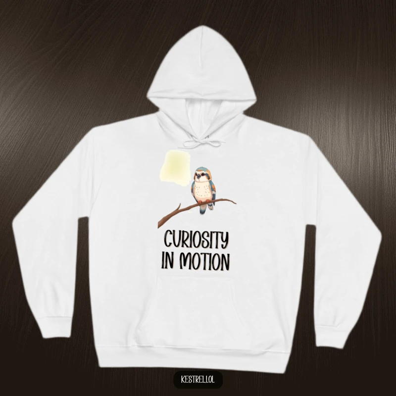 Funny kestrel hoodie showing a curious bird perched on a thin branch, looking around with interest.