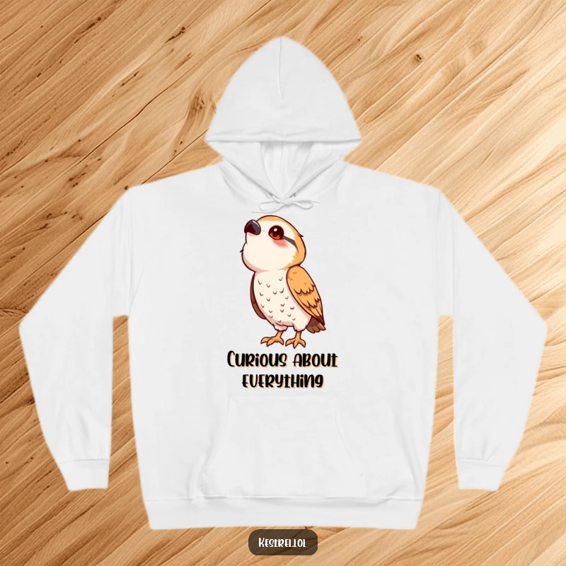 Funny kestrel hoodie featuring a cute, stylized bird character with a playful pose, looking upwards with curiosity and charm.
