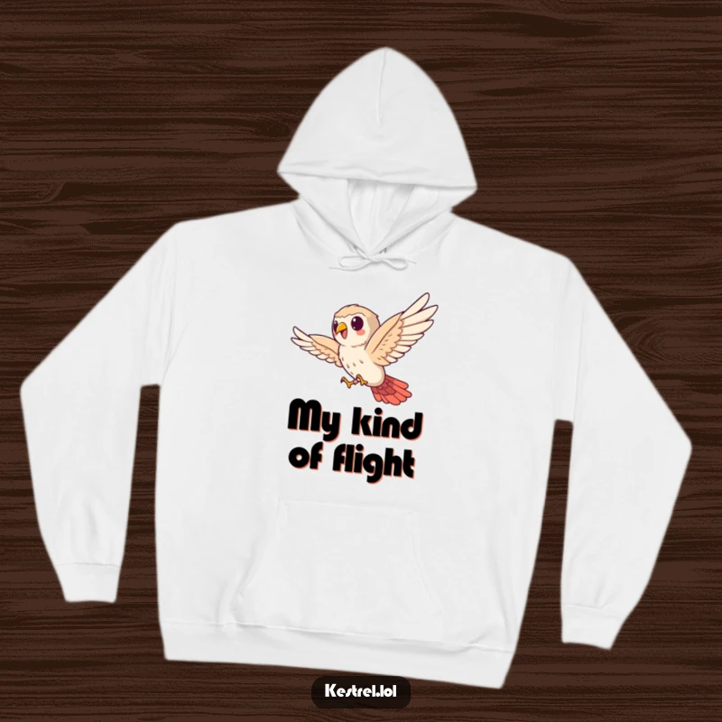 Funny kestrel hoodie, cute bird character bravely soaring sideways, soft and warm, humorous bird lover gift.