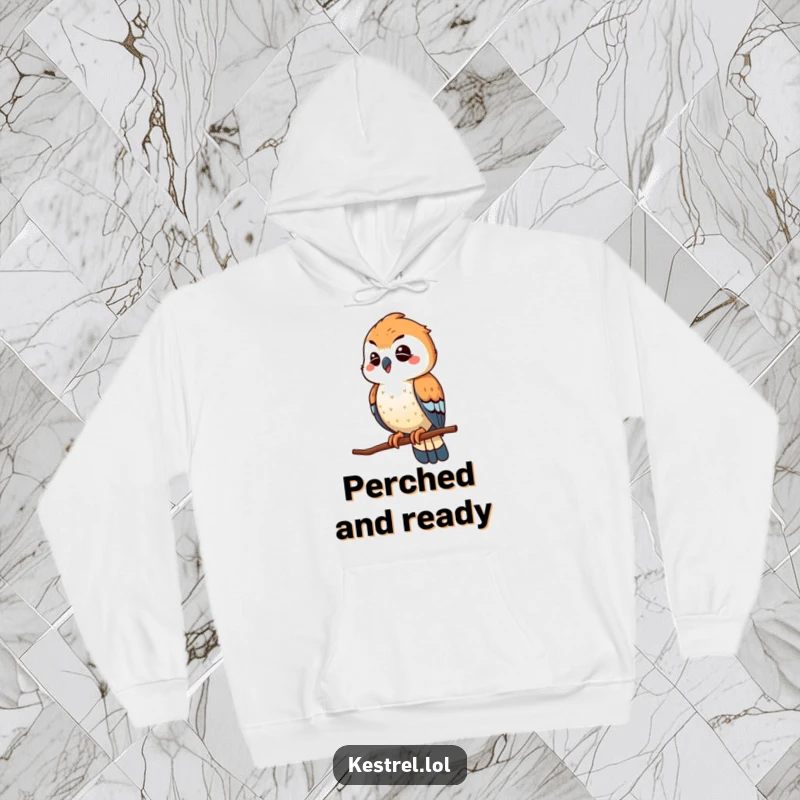 Funny winking kestrel hoodie, showing the bird playfully scouting from a high perch with a knowing wink, stylish and humorous.