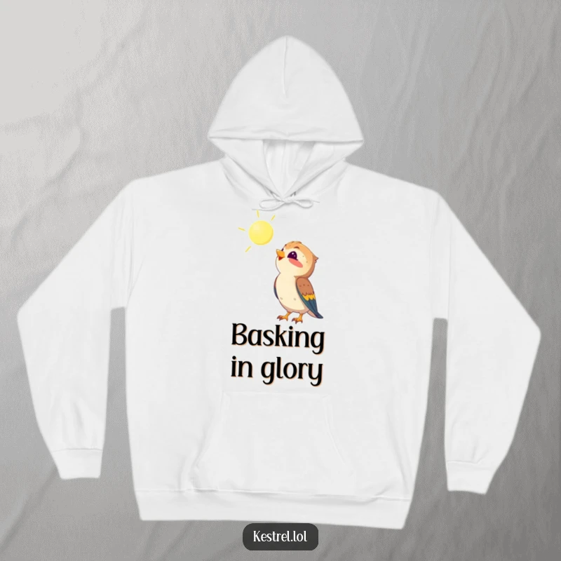 Funny kestrel hoodie showing a kestrel looking up at the sun with delight, combining warmth with cheerful optimism, an excellent funny gift.