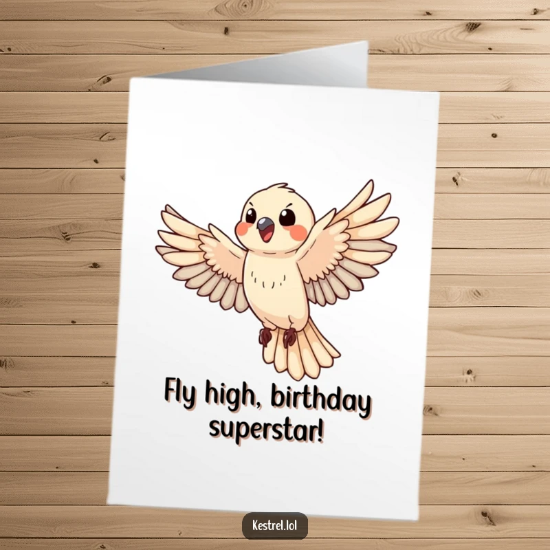 Funny Free Printable Birthday Card: Happy kestrel energetically flapping wings mid-flight, radiating pure joy.