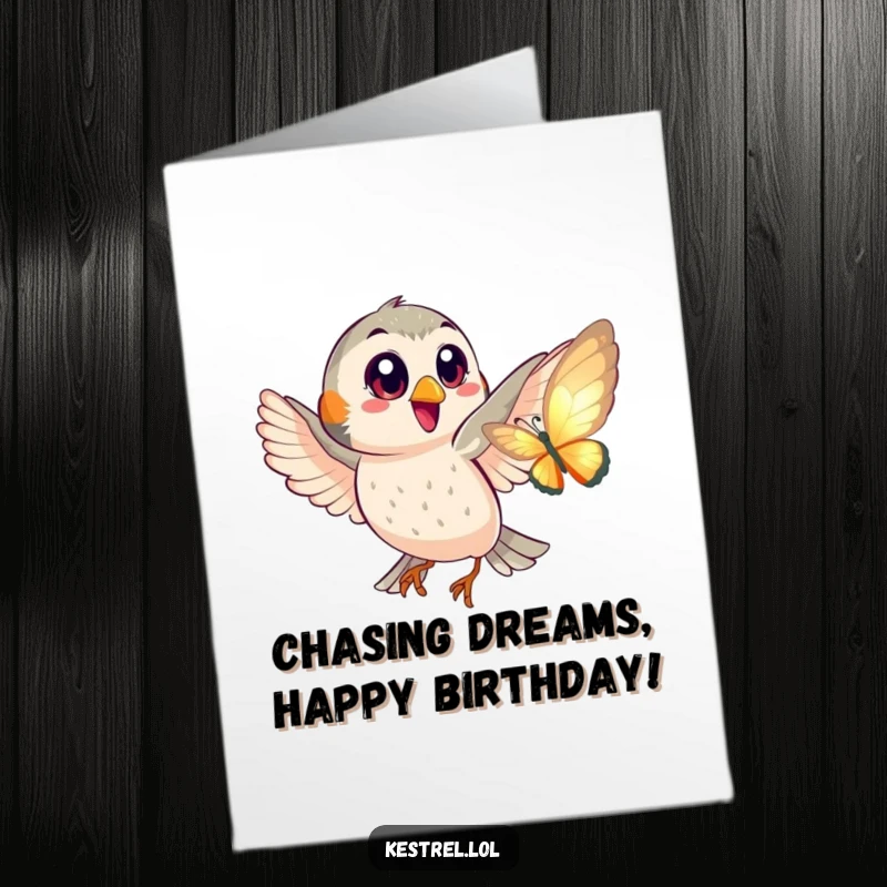 Funny Free Printable Birthday Card of a happy kestrel with big eyes playfully chasing a shimmering butterfly.