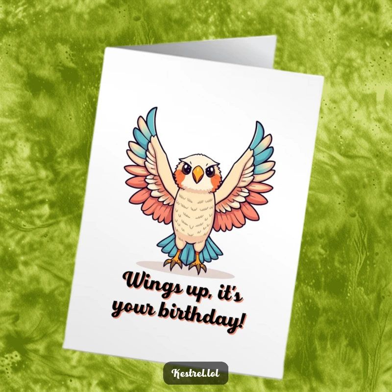 Funny Free Printable Birthday Card: Triumphant kestrel character raising wings in victory, perfect for a celebratory birthday wish.