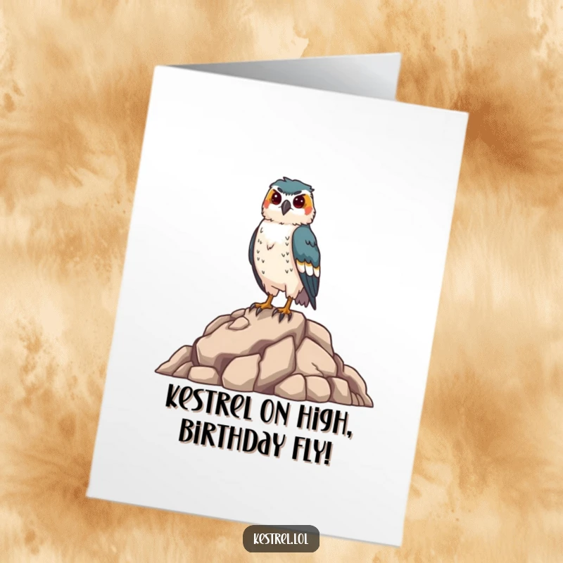 Funny Free Printable Birthday Card: Proud kestrel standing tall on a rocky outcrop, ready to celebrate.