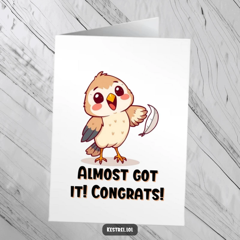 Funny Free Printable Congratulations Card: A cheerful kestrel comically attempting to catch a falling feather, a funny win.