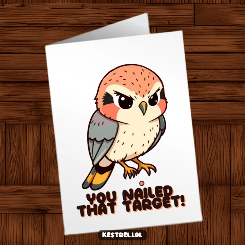 Funny Free Printable Congratulations Card: A determined kestrel intently eyes a tiny movement below, symbolizing focus on success.