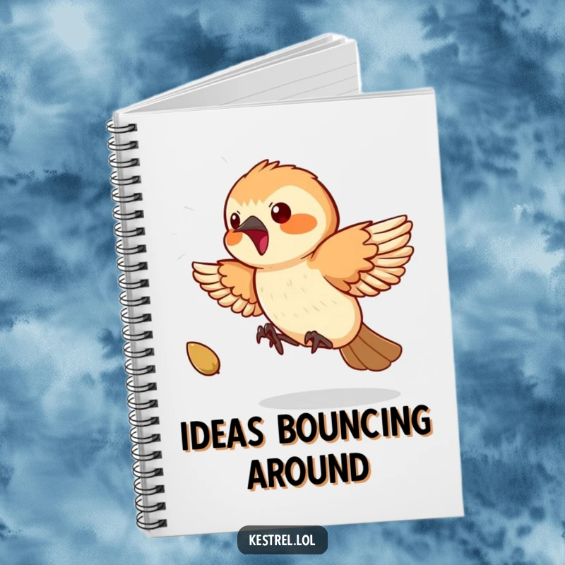 Funny Kestrel Notebook: A playful kestrel humorously chases a bouncing seed, ready to record inspired thoughts.