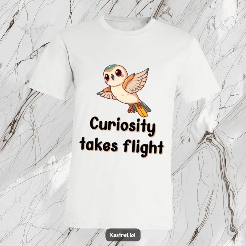 Funny Kestrel T-Shirt: A curious kestrel is captured mid-flight, humorously tilting its head as if questioning everything.