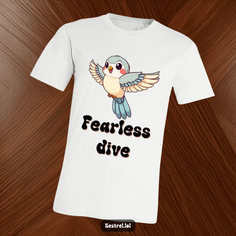 Funny t-shirt depicting a jovial kestrel with wings tucked in swift descent, celebrating speed, focus, and a playful attitude.