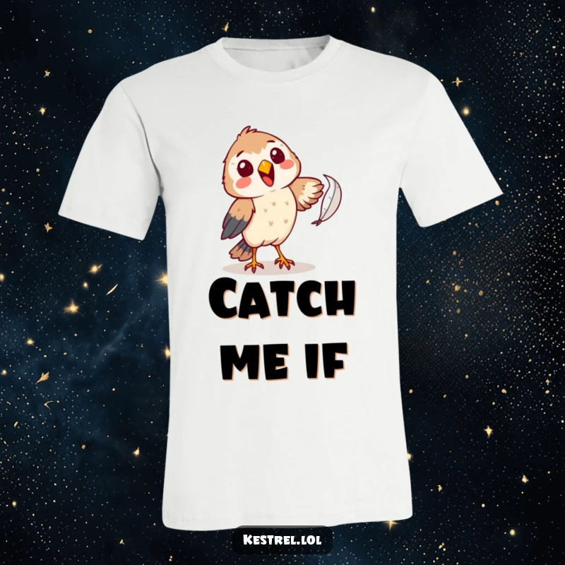 Funny kestrel t-shirt with a cheerful character comically attempting to catch a falling feather, a humorous and whimsical design.