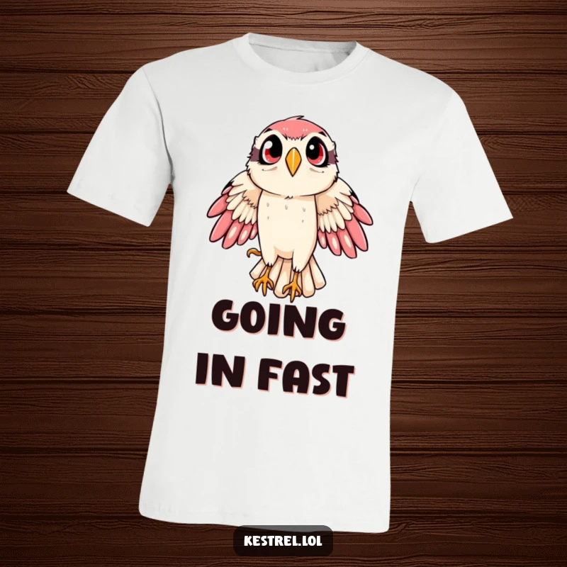 Funny kestrel t-shirt featuring a bird of prey executing a dramatic, wide-eyed swoop mid-flight, conveying speed and excitement.