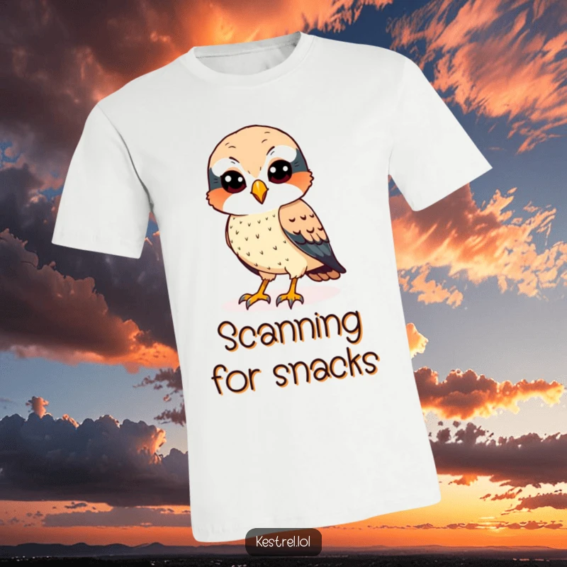 Funny kestrel t-shirt depicting a cheerful bird with sharp eyes, focused on scanning the ground.