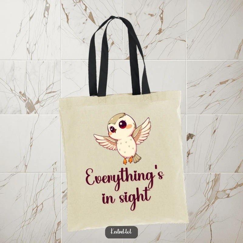 Funny kestrel tote bag depicting a curious bird hovering, a practical and humorous accessory for bird lovers. Ideal gift.