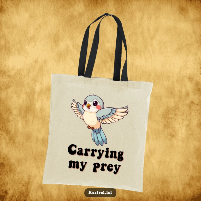 Funny tote bag illustrating a jovial kestrel with wings tucked in swift descent, ideal for carrying essentials with a humorous and dynamic vibe.